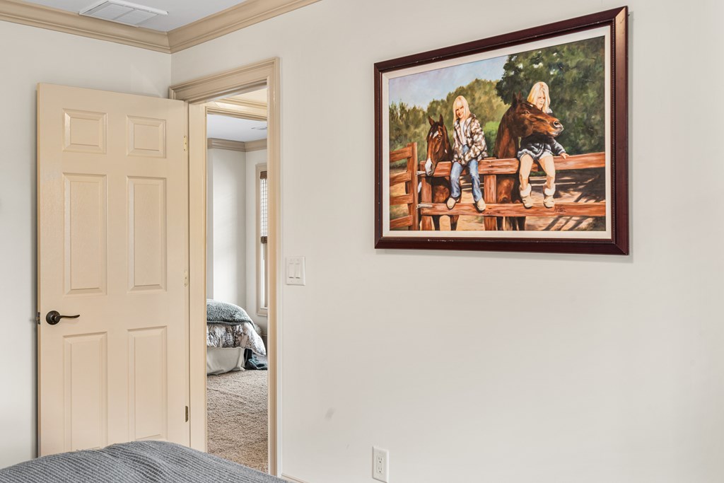 476 Licklog Ridge Hayesville, NC 28904 - Photo 35 of 41 a view of a hallway with paintings on the wall