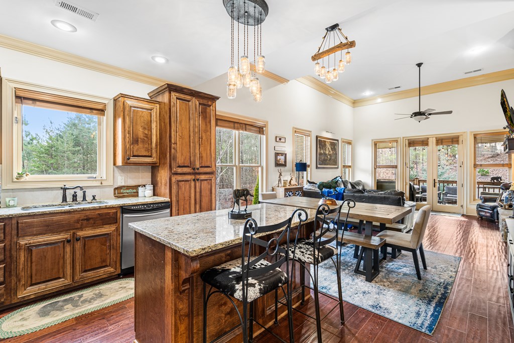 476 Licklog Ridge Hayesville, NC 28904 - Photo 9 of 41 a view of a dining room with furniture window and wooden floor