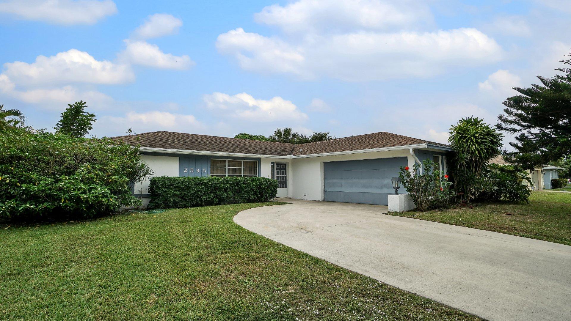 2545 Inisbrook Road Riviera Beach, FL 33407 - Photo 2 of 19 11750-DSC02738-902434c8