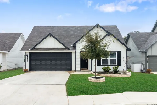 a house view with a garden space