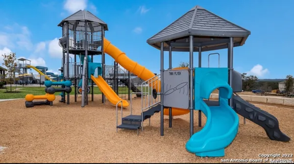 a view of a park with slide