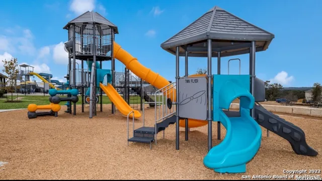 a view of a park with slide