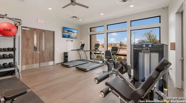 a view of a swimming pool with a lounge chair
