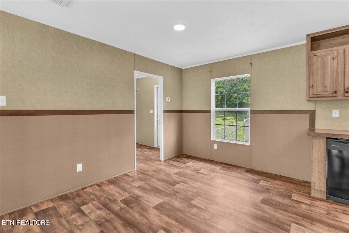 109 Post Oak Springs Road Rockwood, TN 37854 - Photo 11 of 24 a view of an empty room with a window