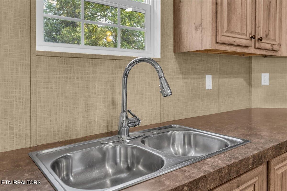 109 Post Oak Springs Road Rockwood, TN 37854 - Photo 14 of 24 a close view of sink and tap