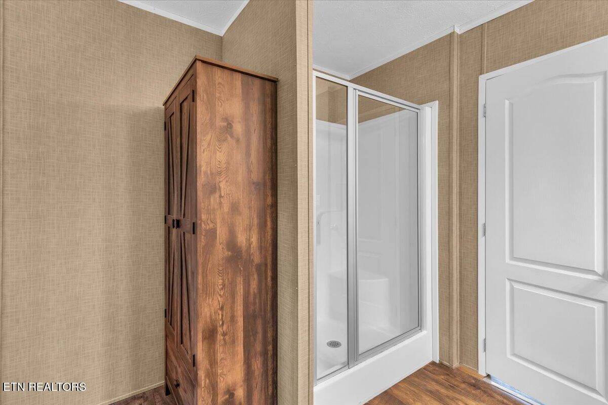 109 Post Oak Springs Road Rockwood, TN 37854 - Photo 24 of 24 a bathroom with a shower and a glass door