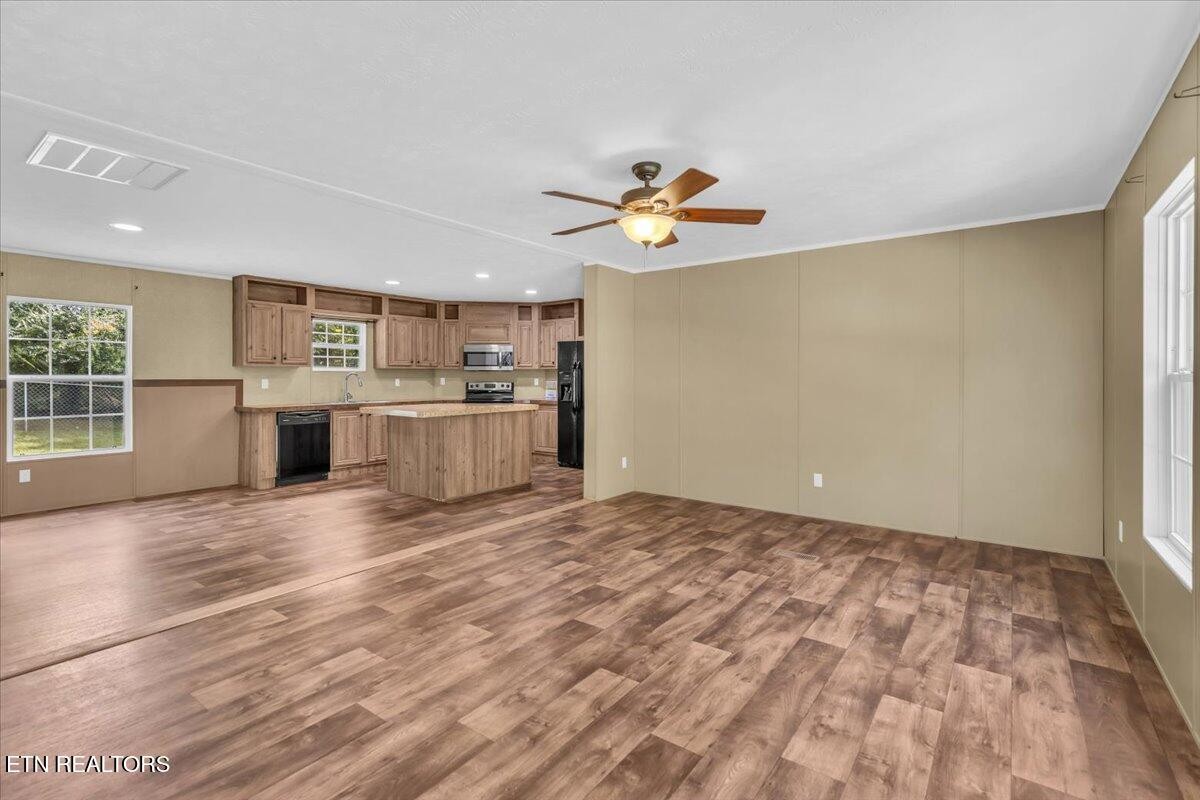 109 Post Oak Springs Road Rockwood, TN 37854 - Photo 10 of 24 a view of a kitchen with a sink and a window