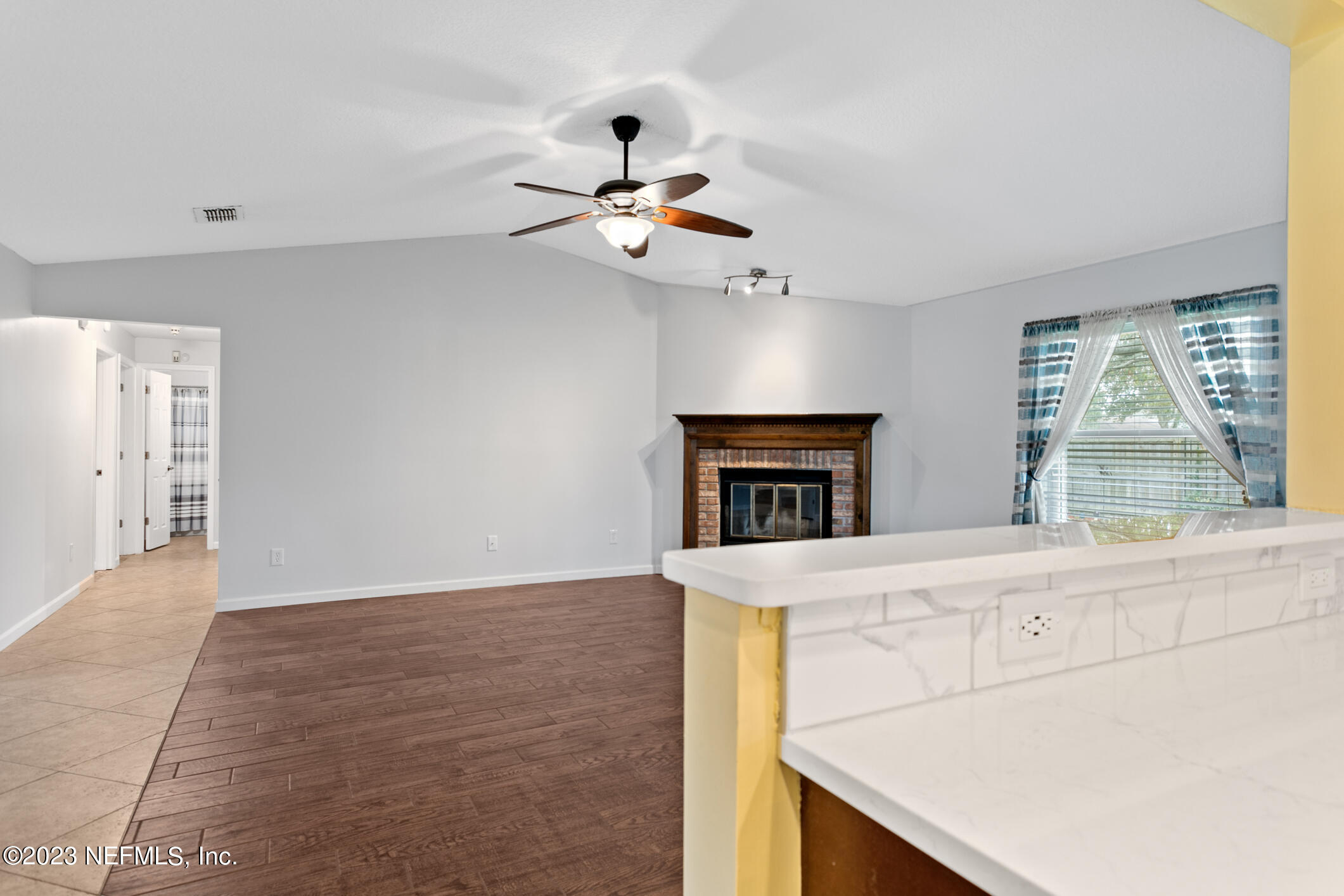 12403 Running River Road South Jacksonville, FL 32225 - Photo 13 of 51 Living Room from Kitchen