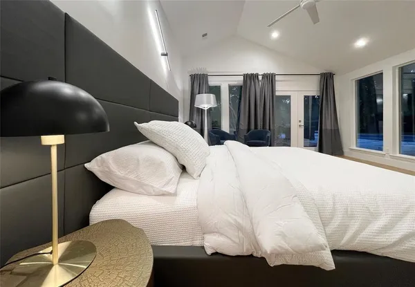 a bathroom with a bathtub a toilet a sink and mirror