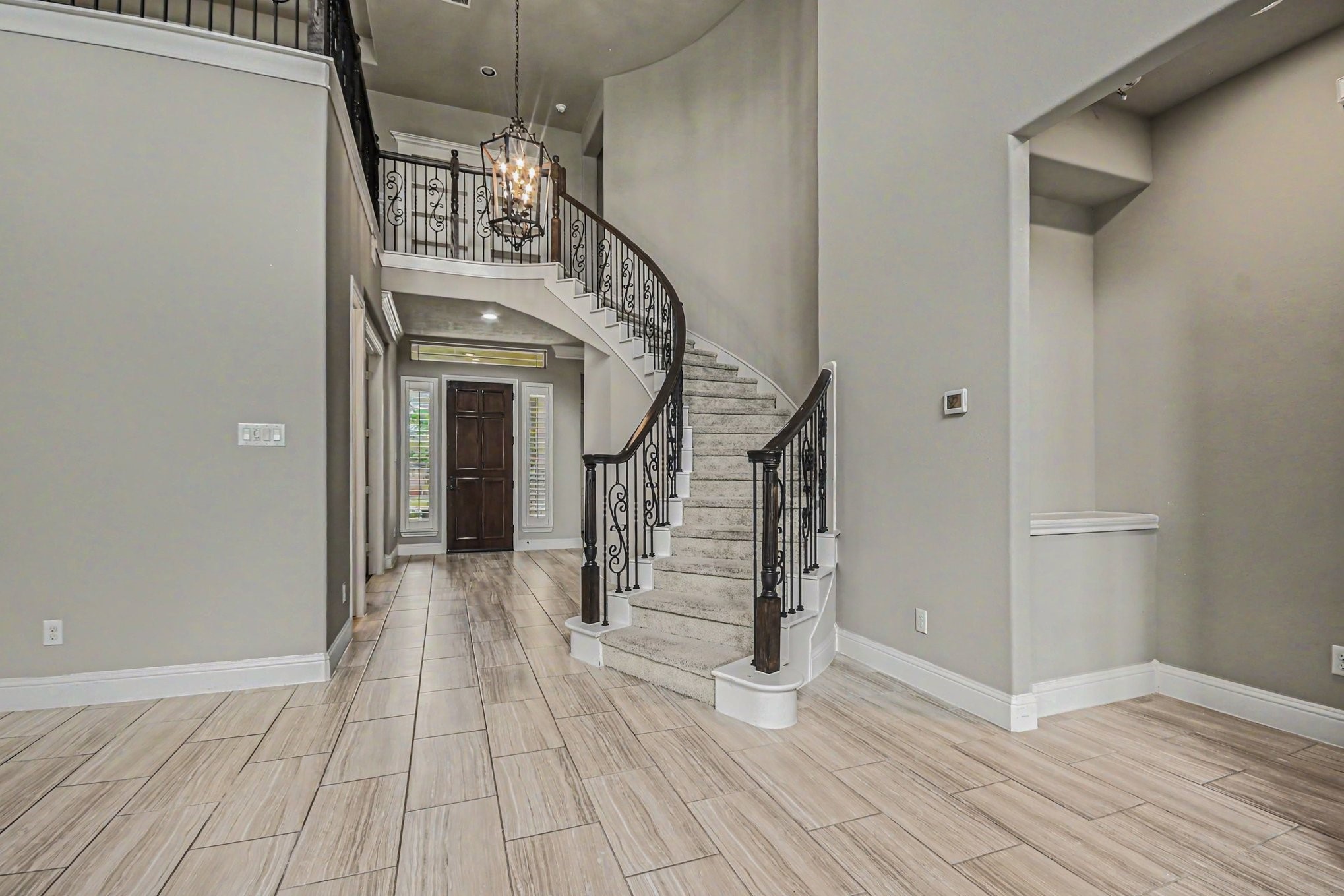 3310 Ralston Edge Lane Houston, TX 77059 - Photo 10 of 50 a view of entryway and hall with wooden floor