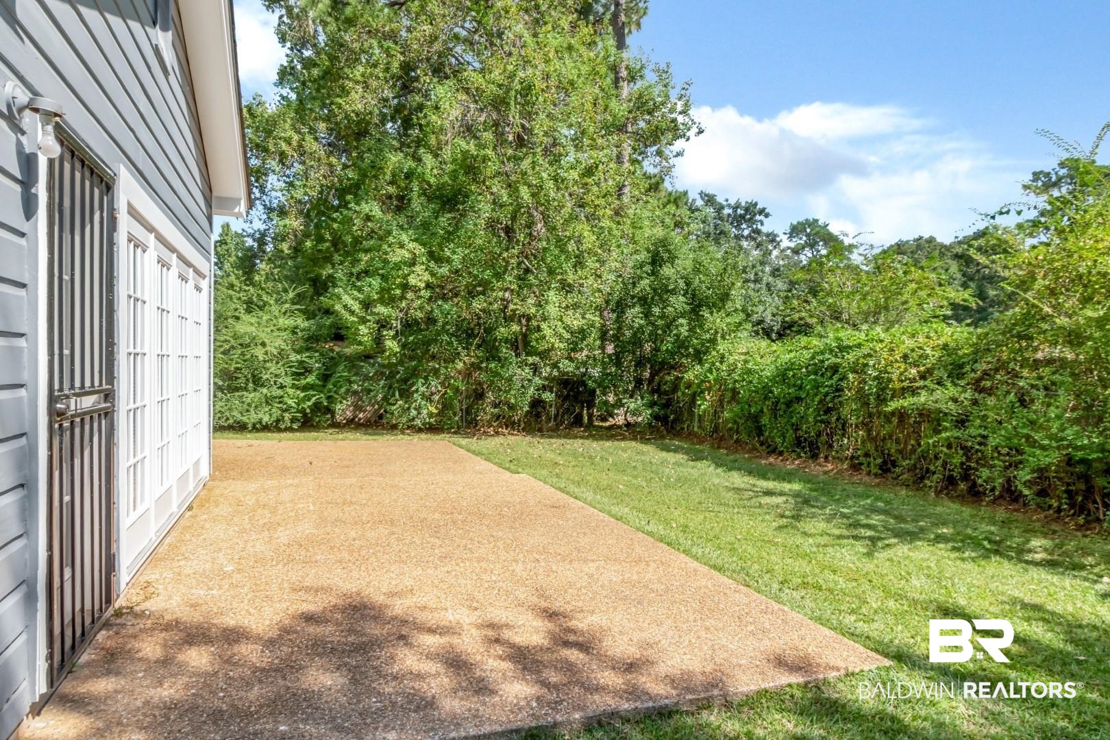 1477 Fairfield Street Mobile, AL 36606 - Photo 30 of 34 View of grassy yard with a patio area