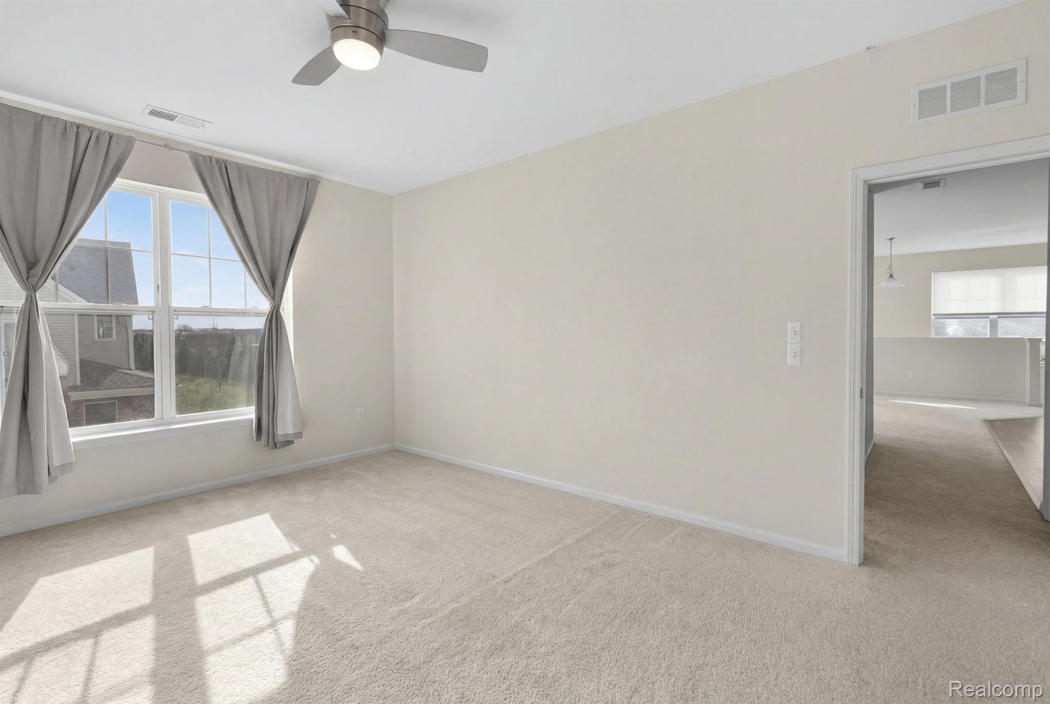 9812 Ridge Run, Unit 55 Howell, MI 48855 - Photo 13 of 23 Primary bedroom