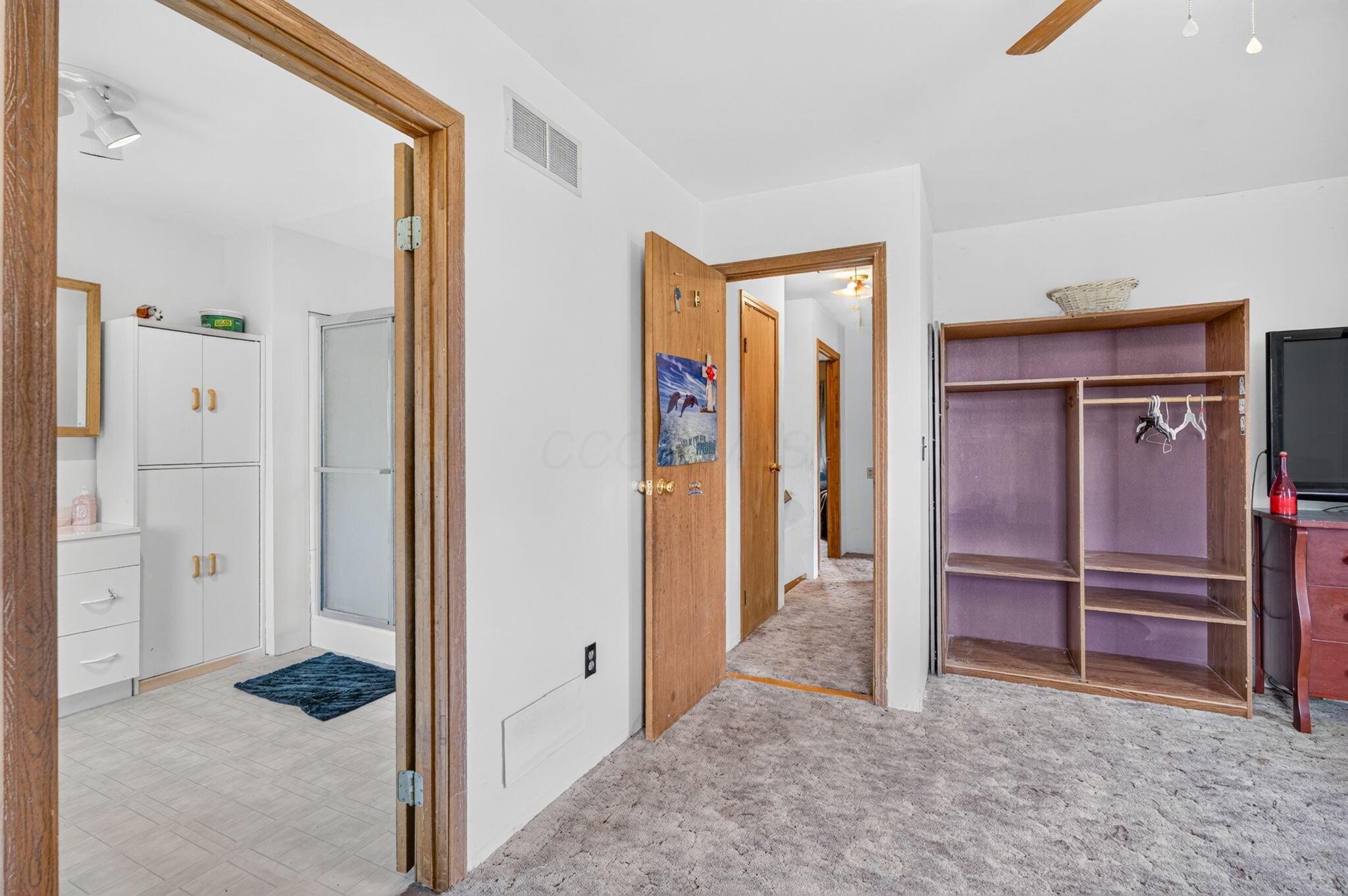 4780 North Section Line Road Radnor, OH 43066 - Photo 49 of 79 White walls with wood-finish trim and doors