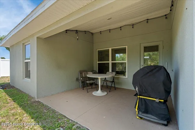 a house view with a garden space