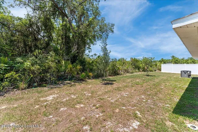 a house with trees in front of it