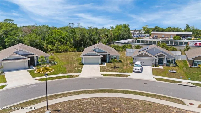 an aerial view of multiple house