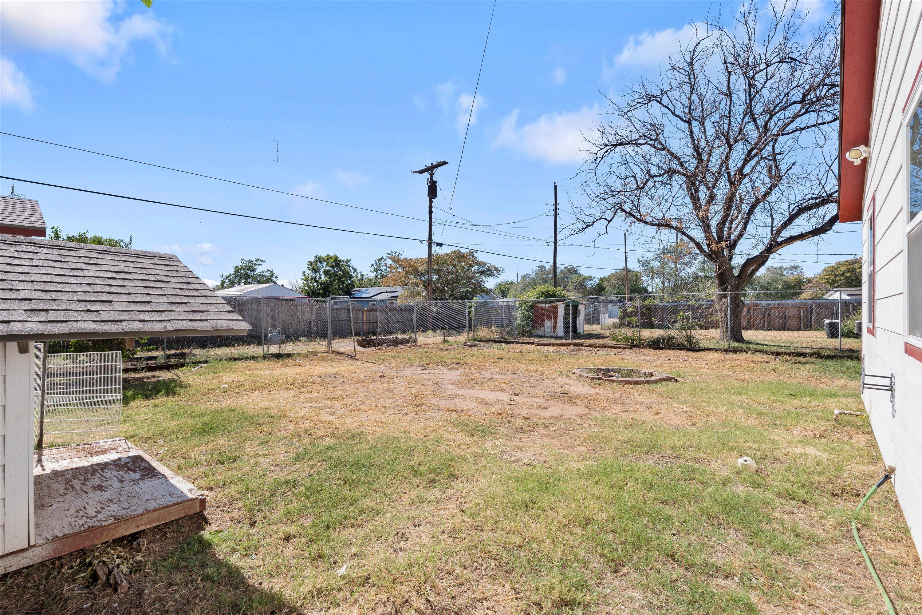 2009 65th Street Lubbock, TX 79412 - Photo 22 of 24 a view of a swimming pool with an outdoor space