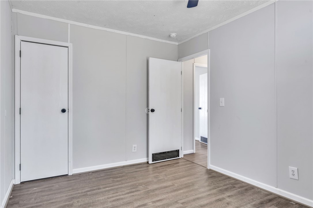 119 Ray Drive Pickens, SC 29671 - Photo 22 of 27 This spacious room features durable flooring and multiple access points.