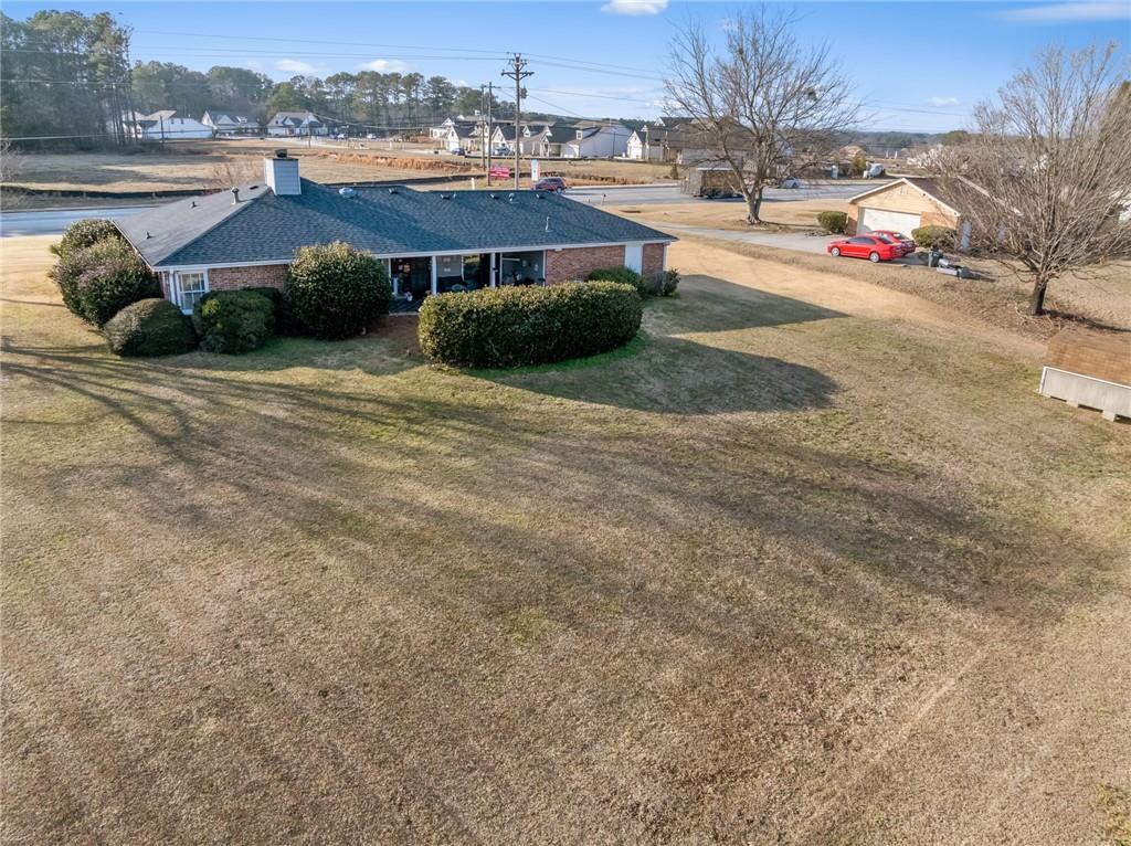 3492 Rosebud Road Loganville, GA 30052 - Photo 22 of 22 a view of house and outdoor space