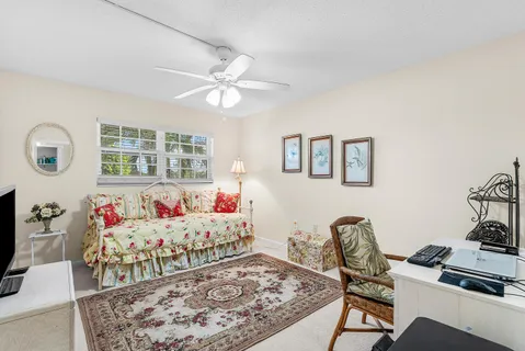 a bedroom with furniture and a bed