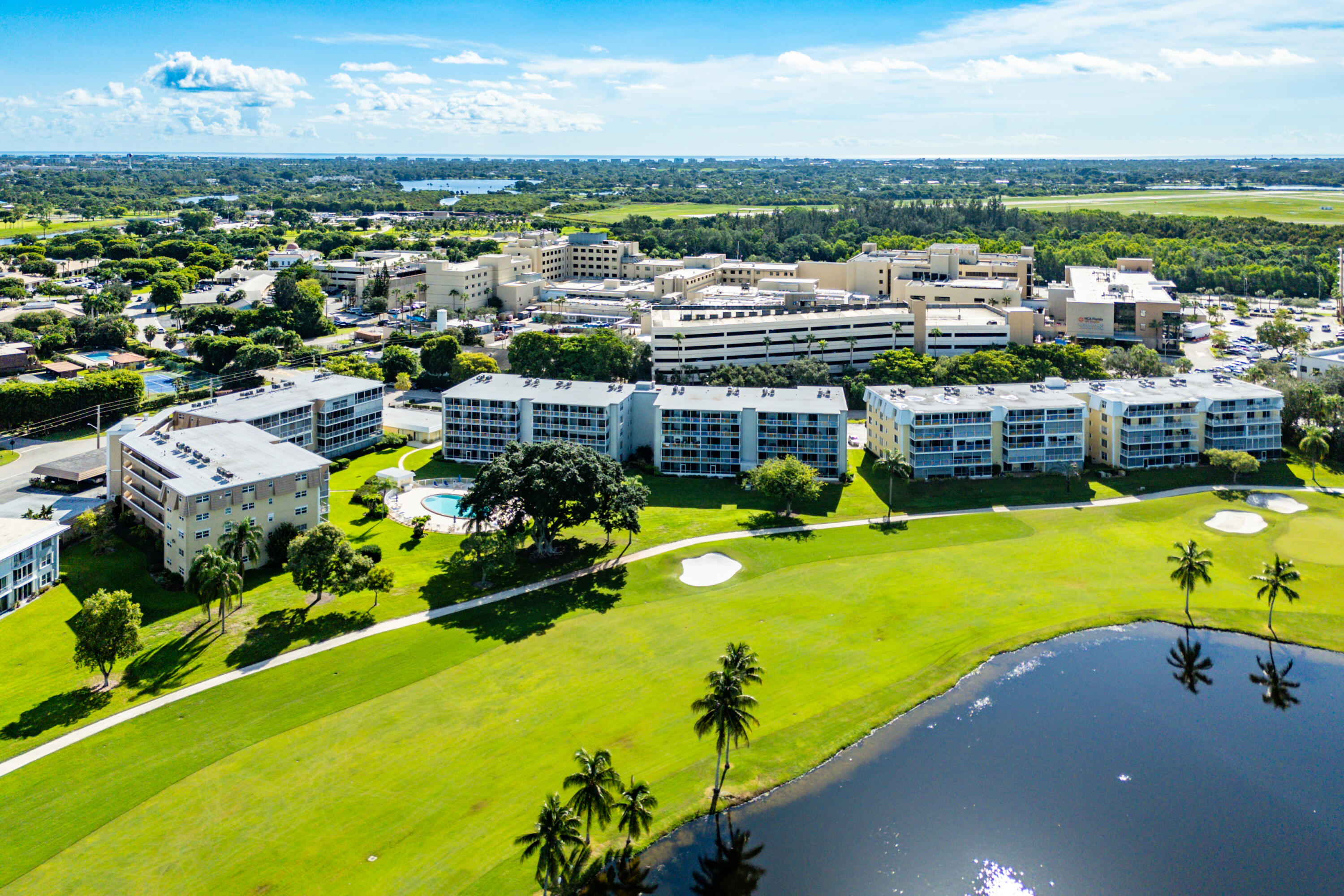145 Atlantis Boulevard, Unit 203 Atlantis, FL 33462 - Photo 31 of 33 a view of a city with an ocean