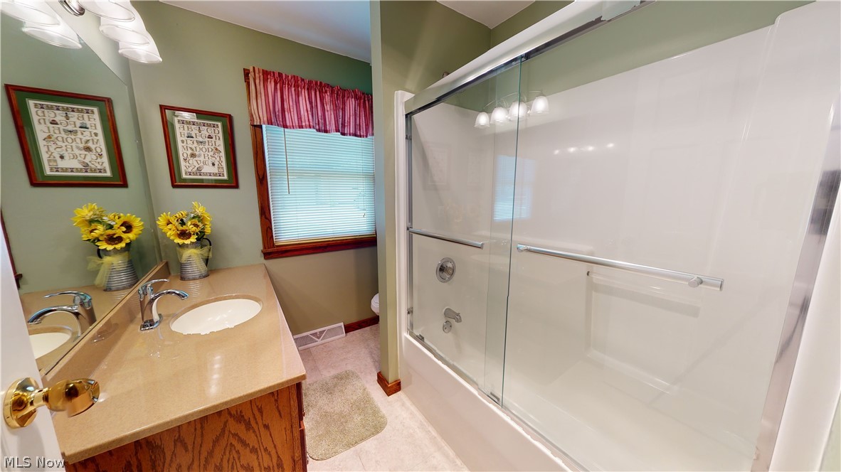 18142 Madison Road Middlefield, OH 44062 - Photo 23 of 35 Full bath the has been updated with newer countertops and sink.