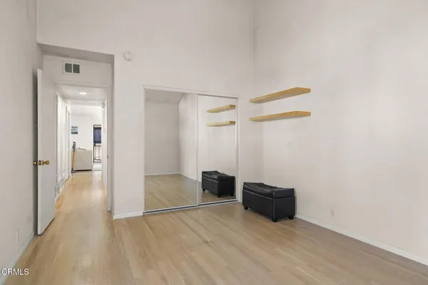 a view of a livingroom with wooden floor