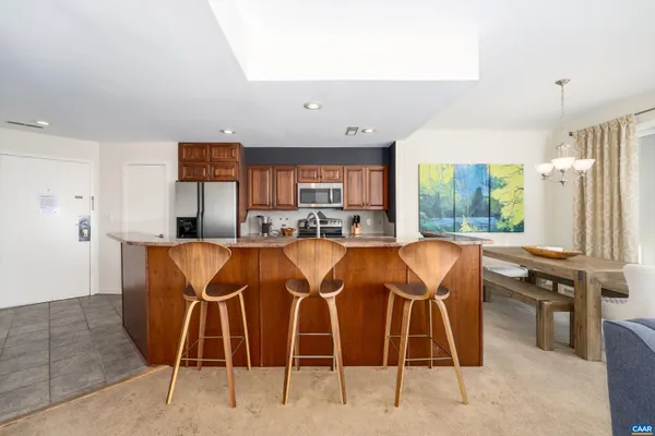 a dinning table and chairs in a room