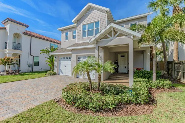 an aerial view of a house with a garden