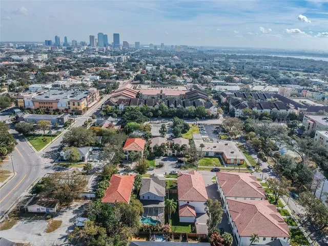 a view of house with yard and entertaining space