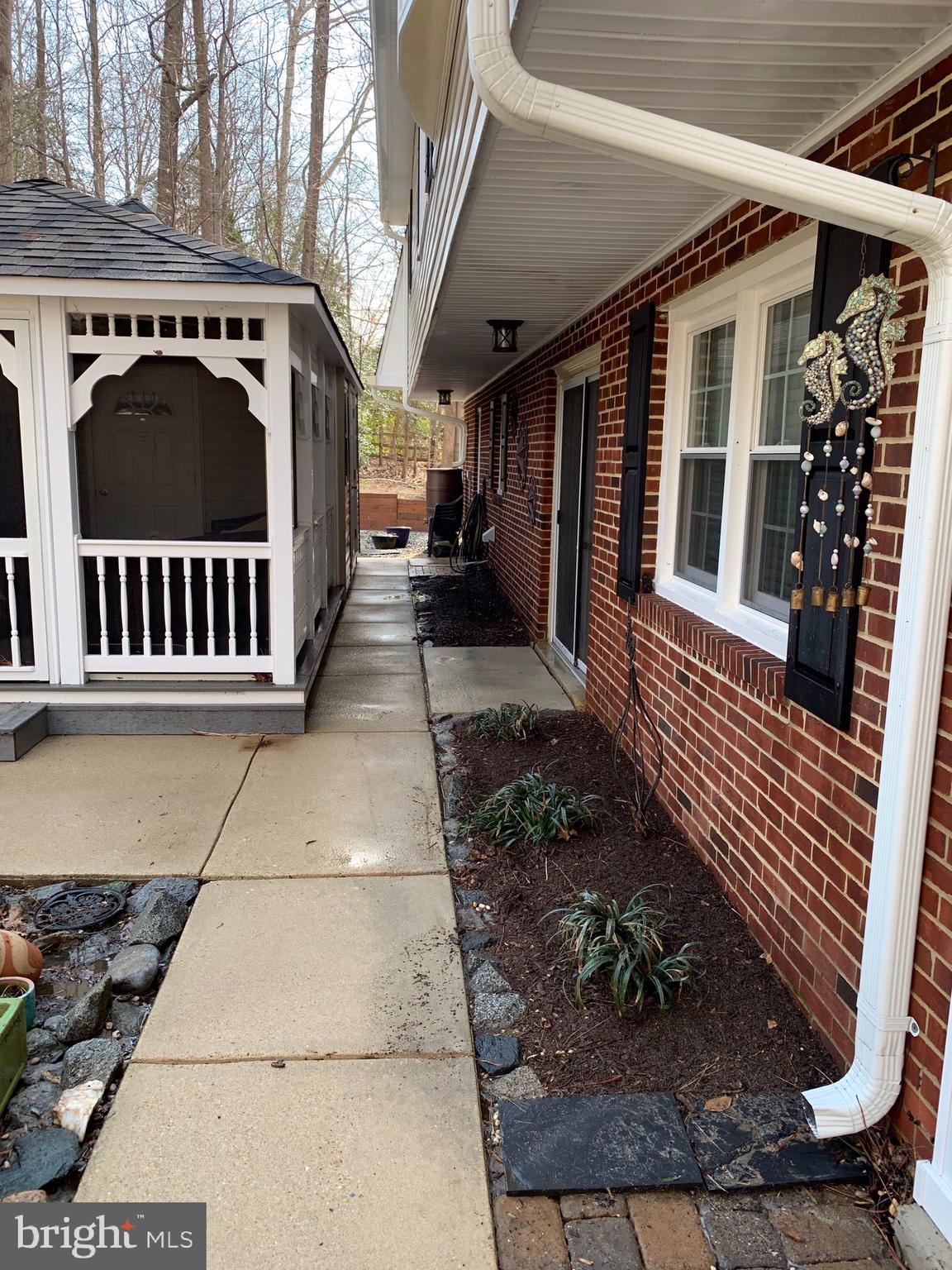 526 Clarks Run Road La Plata, MD 20646 - Photo 7 of 9 Rear of home and side of Poolhouse porch