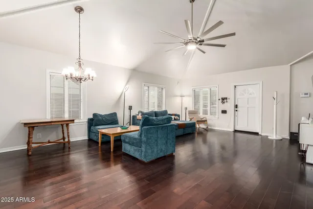 a view of a livingroom with furniture and window