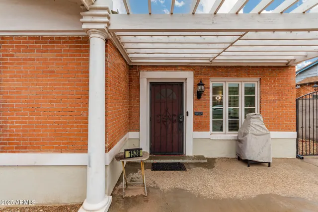 a view of house with large windows