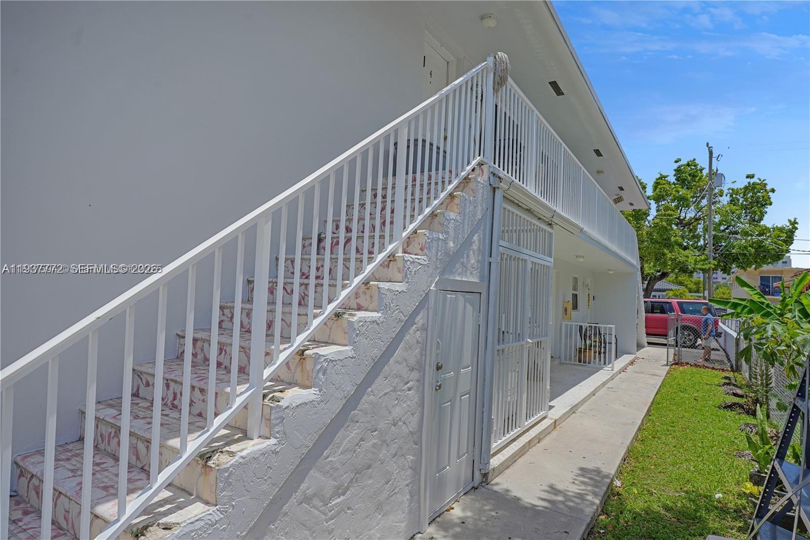 1621 Northwest 16th Street Miami, FL 33125 - Photo 8 of 13 a view of room with staircase