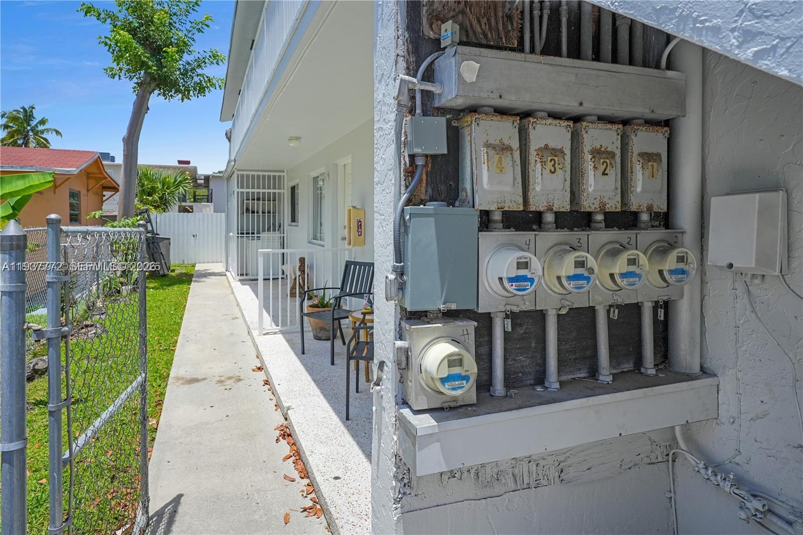 1621 Northwest 16th Street Miami, FL 33125 - Photo 10 of 13 front view of a house with a yard