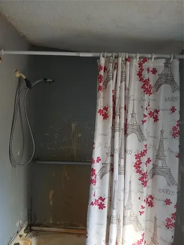 a bathroom with a toilet and a sink