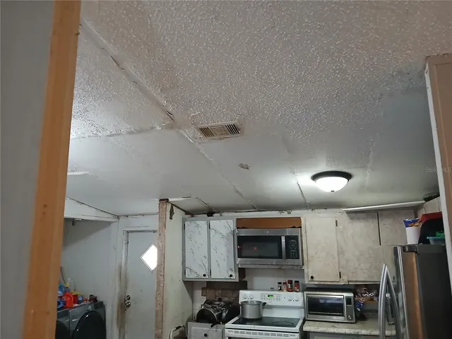 a view of a yard with table and chairs