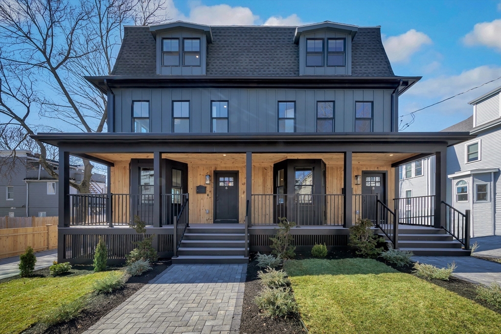 6 Berkeley Street Somerville, MA 02143 - Photo 2 of 41 a view of a house with a small yard plants and large tree