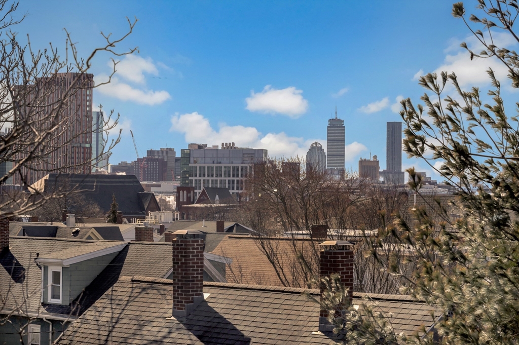 6 Berkeley Street Somerville, MA 02143 - Photo 22 of 41 a view of a city with tall buildings
