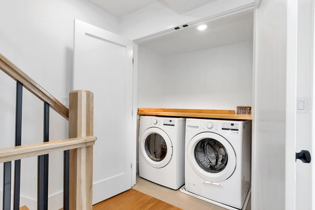 6 Berkeley Street Somerville, MA 02143 - Photo 23 of 41 a utility room with dryer and washer