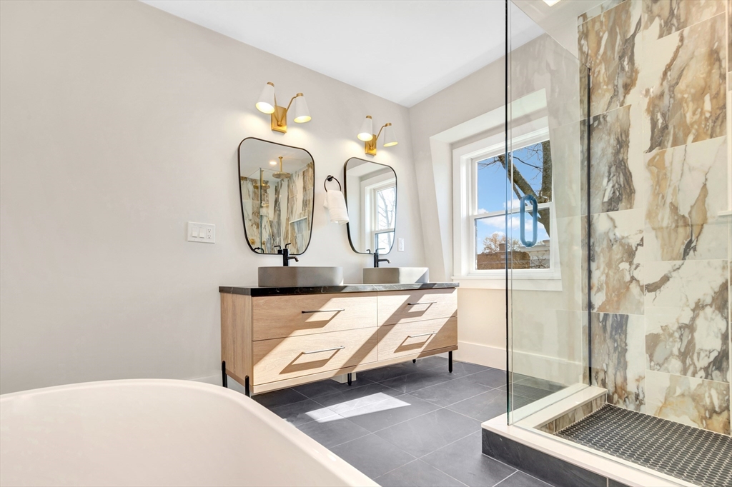 6 Berkeley Street Somerville, MA 02143 - Photo 29 of 41 a living room with furniture and a mirror