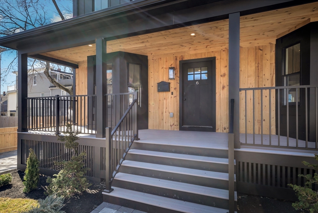 6 Berkeley Street Somerville, MA 02143 - Photo 3 of 41 a view of staircase with railing and a window