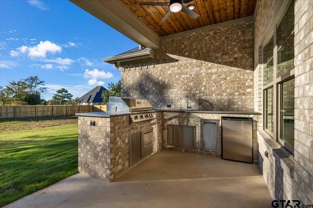 a view of a backyard of the house