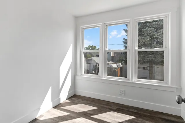 a view of a room that has a window in it