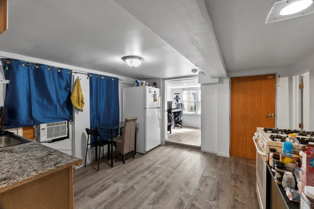 a view of a kitchen and a sink