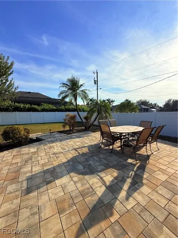 a view of a terrace with chairs