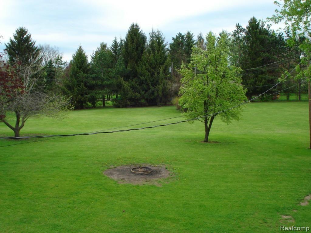 5474 Whipple Lake Road Clarkston, MI 48348 - Photo 9 of 47 Yard/ Firepit