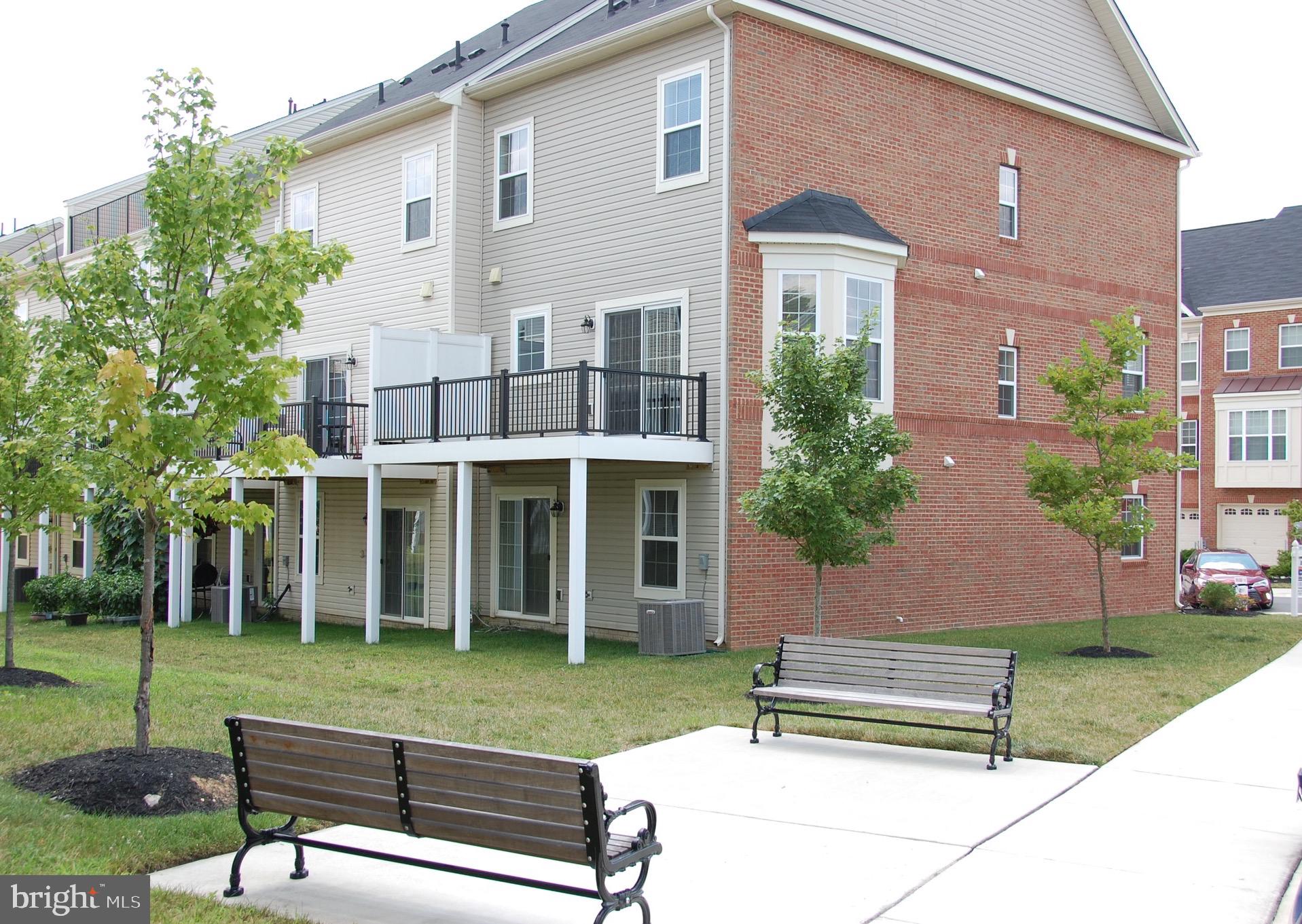 8011 Ravenclaw Road Elkridge, MD 21075 - Photo 29 of 34 End of Unit with Park Bench Seating