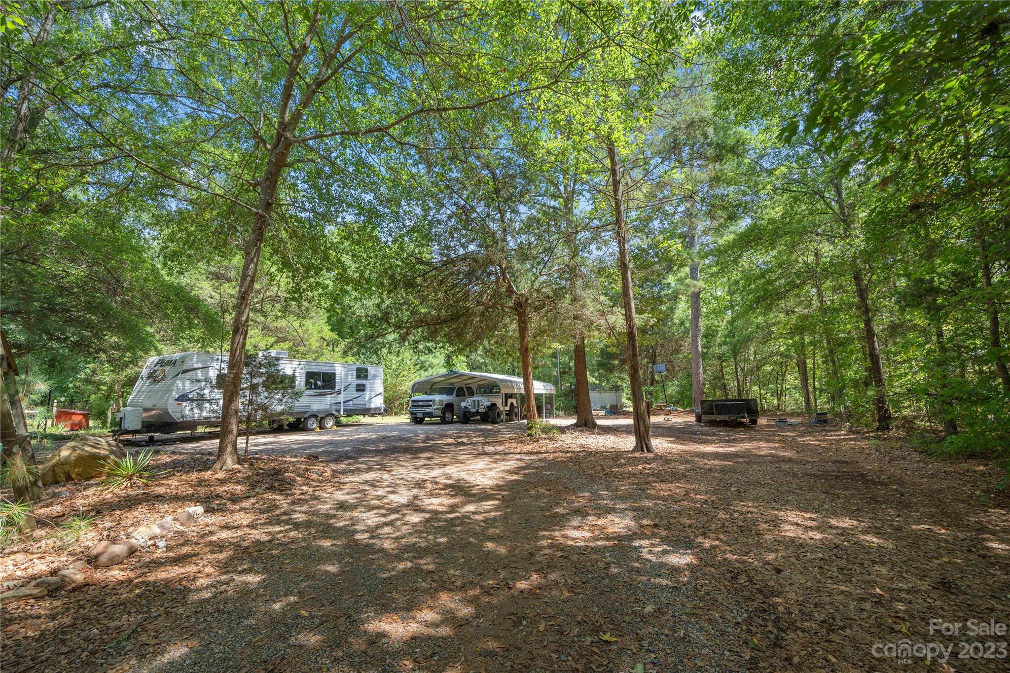 442 Tirzah Church Road Lancaster, SC 29720 - Photo 21 of 29 a view of a house with large trees and park