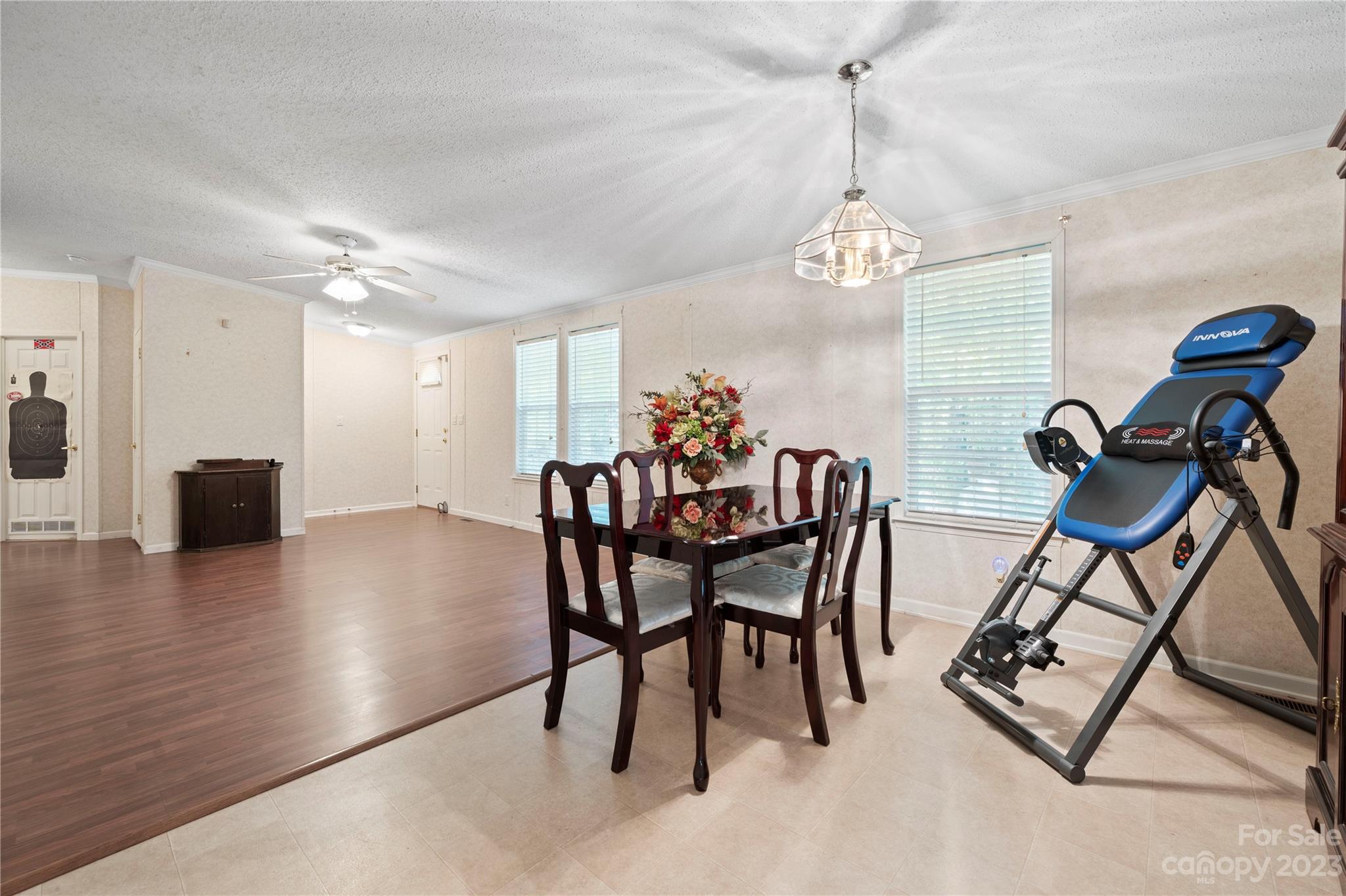 442 Tirzah Church Road Lancaster, SC 29720 - Photo 6 of 29 a view of a dining room with furniture and wooden floor